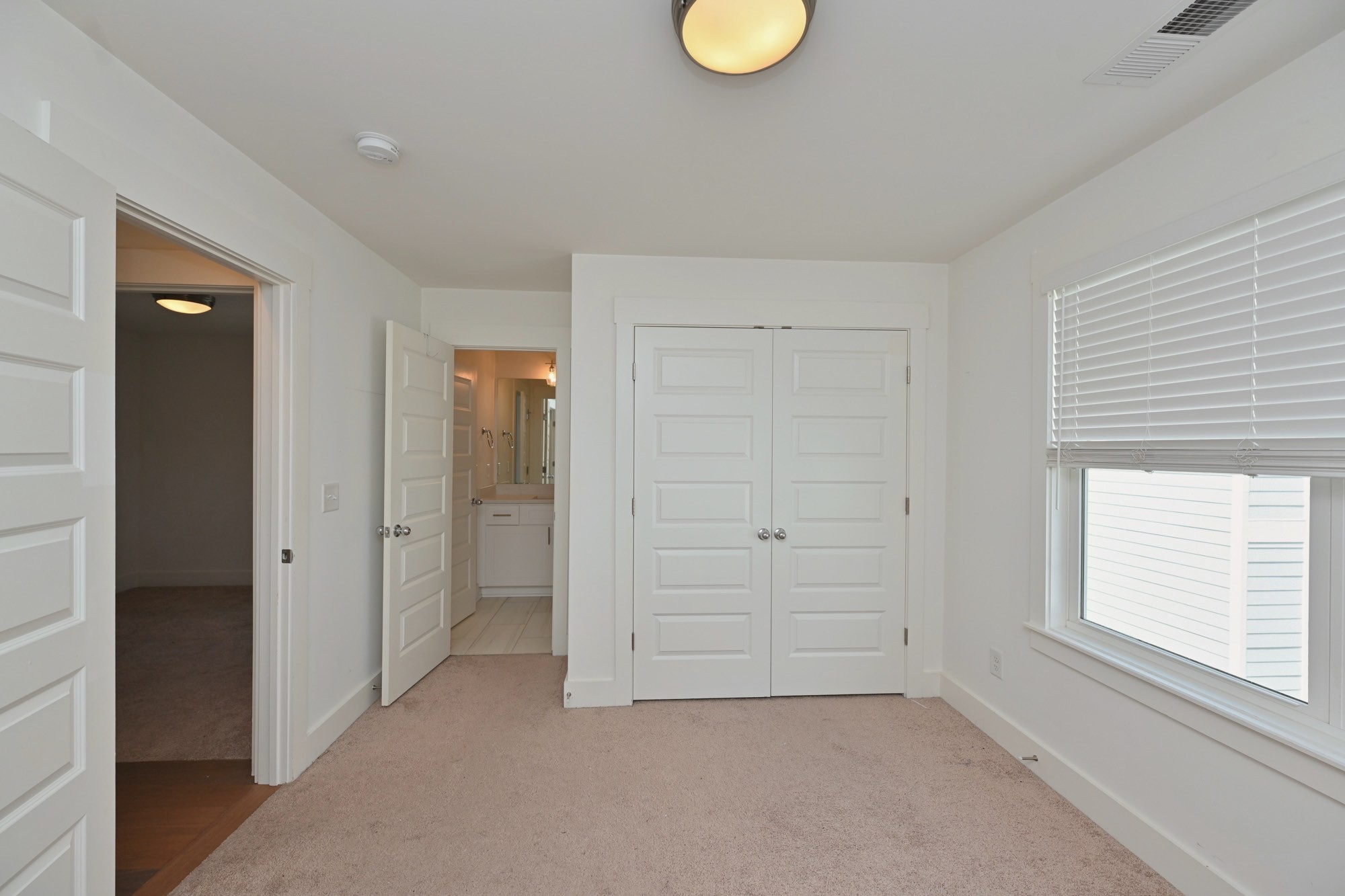 422 Creative Way Madison, TN 37115 - Photo 27 of 31 an empty room with windows and closet