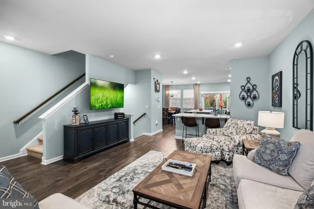 a view of backyard with seating space and yard