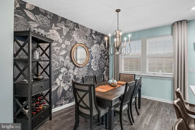 a kitchen with stainless steel appliances granite countertop a sink stove microwave and cabinets