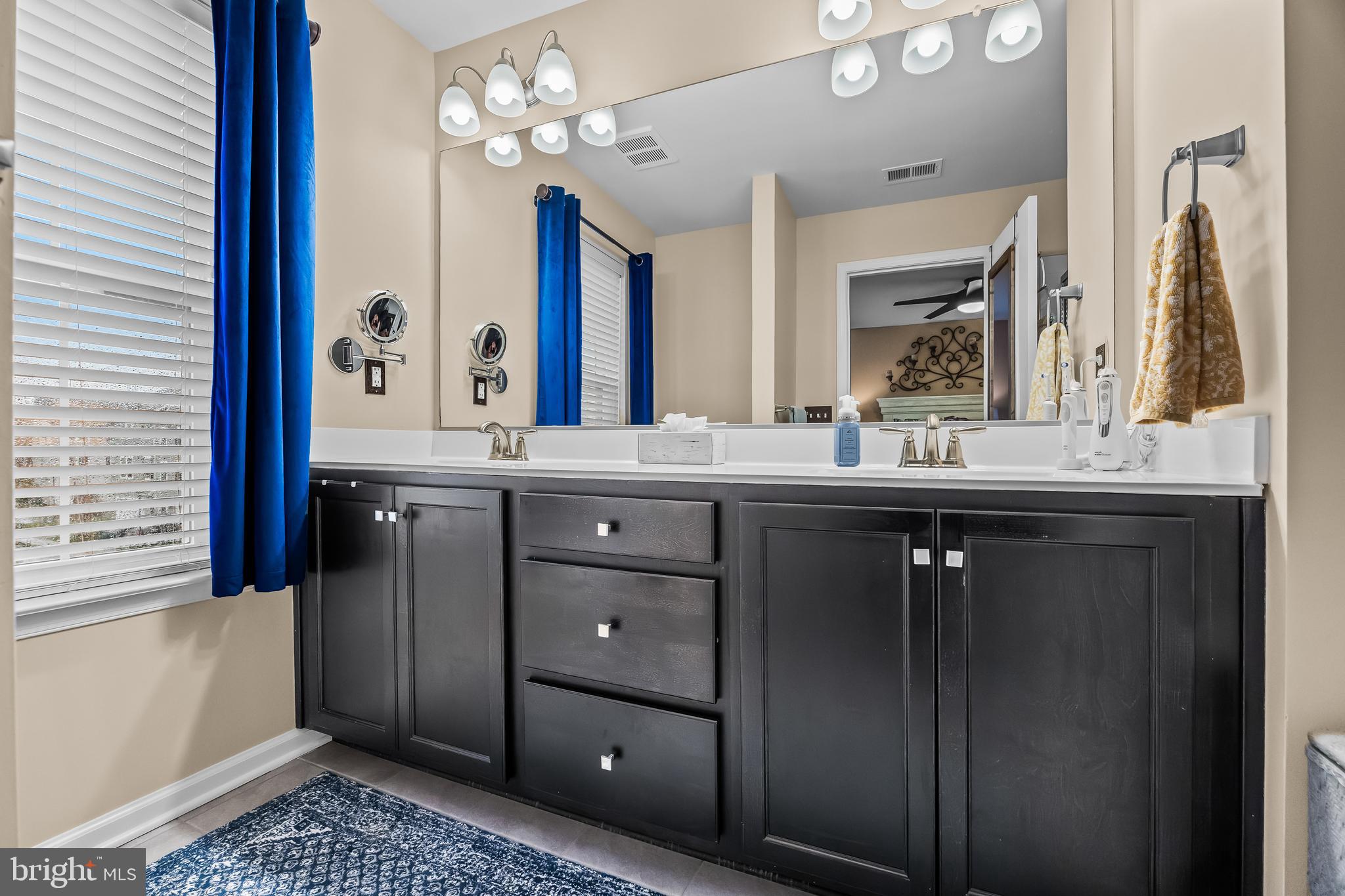 10 Naples Lane Mount Laurel, NJ 08054 - Photo 19 of 27 a bathroom with a sink and a mirror