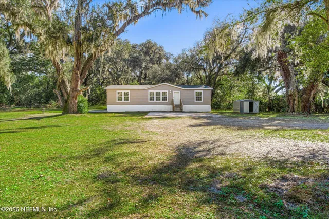 a house view with a outdoor space