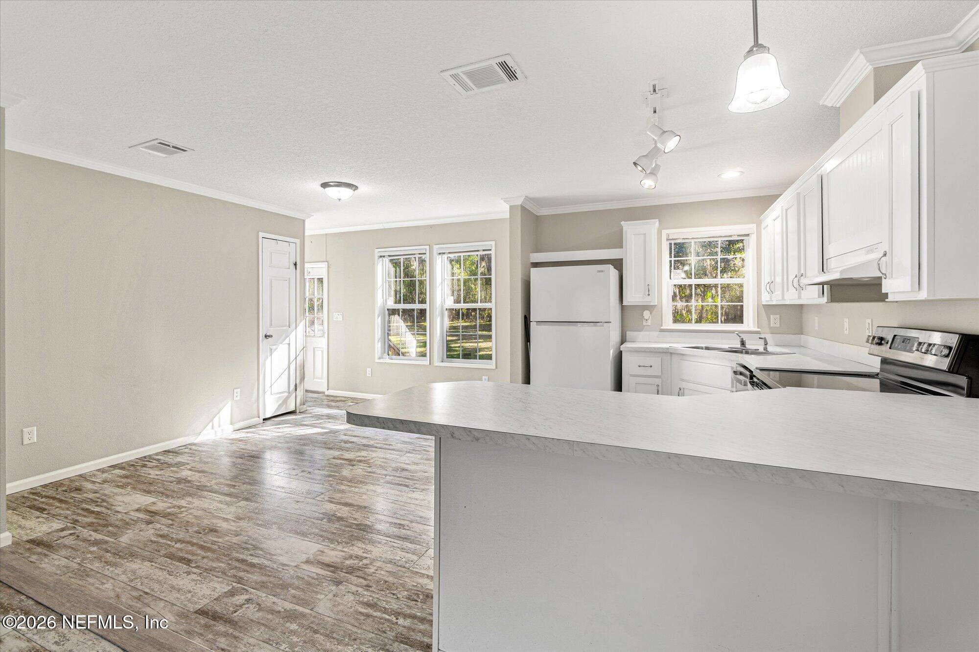 130 Sisco Road Pomona Park, FL 32181 - Photo 11 of 43 a view of an empty room with a window