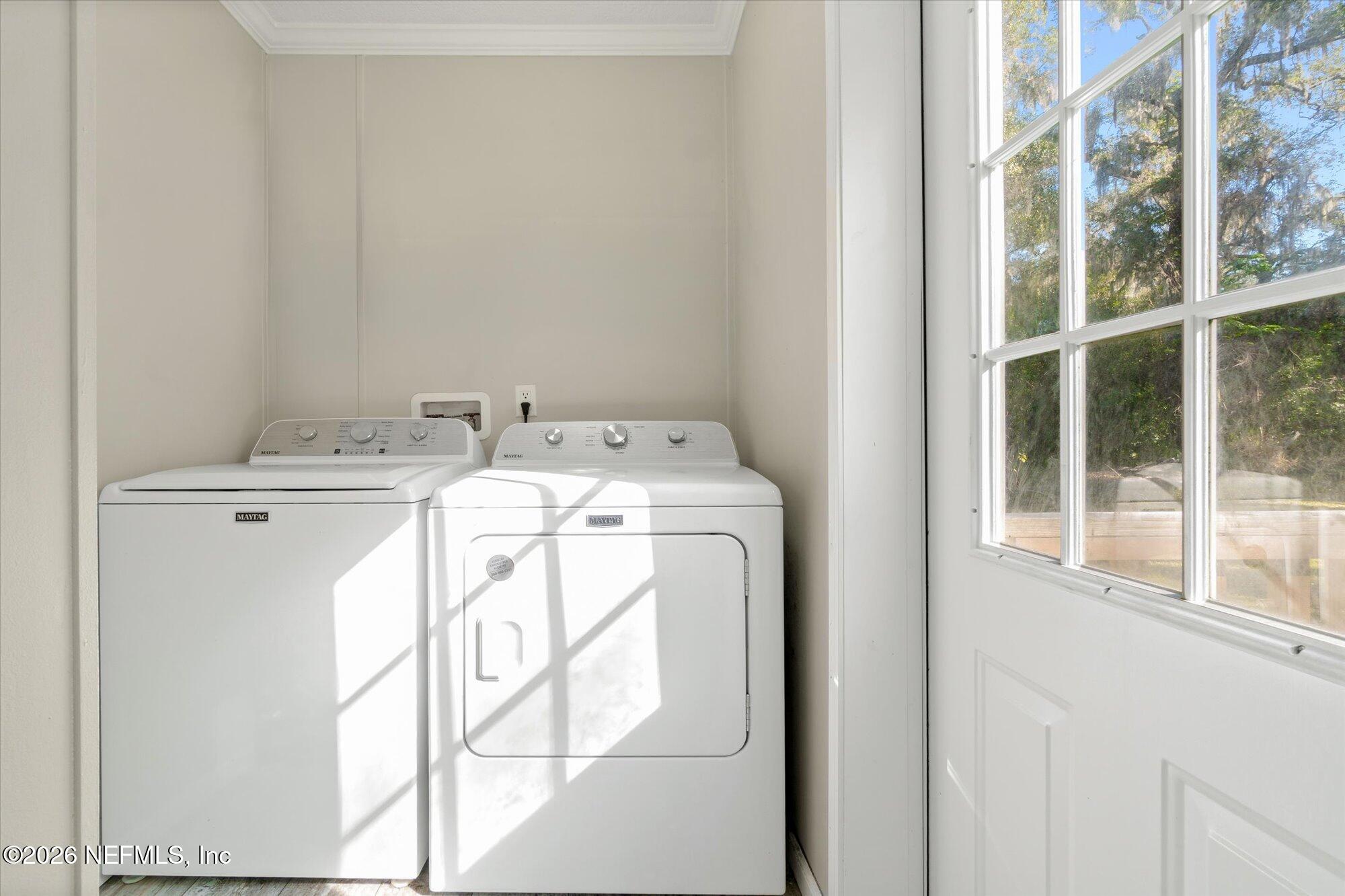 130 Sisco Road Pomona Park, FL 32181 - Photo 28 of 43 a utility room with dryer and washer