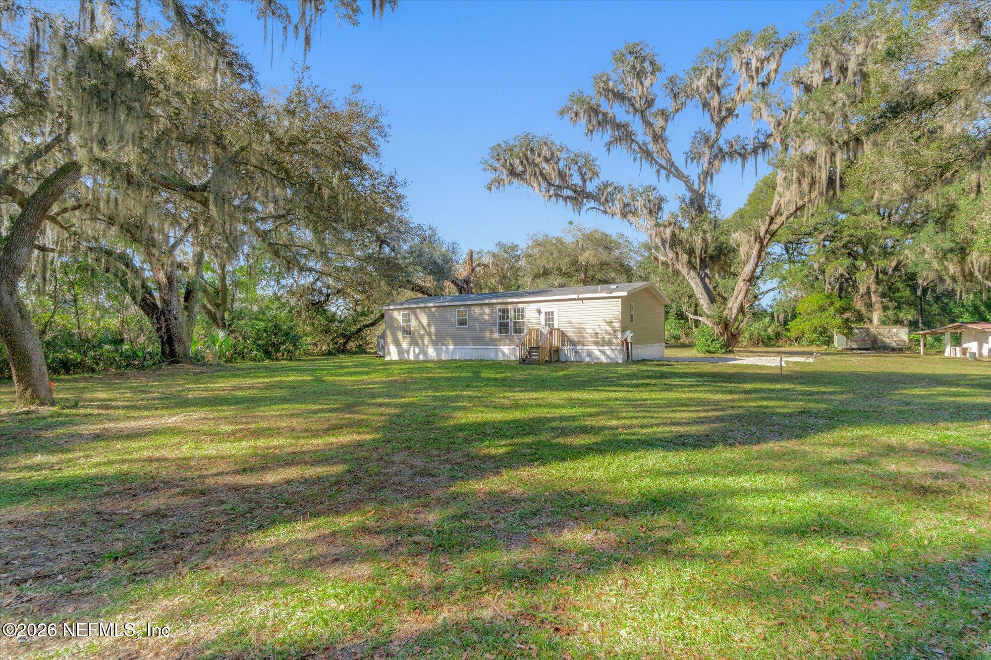 130 Sisco Road Pomona Park, FL 32181 - Photo 33 of 43 a view of a golf course