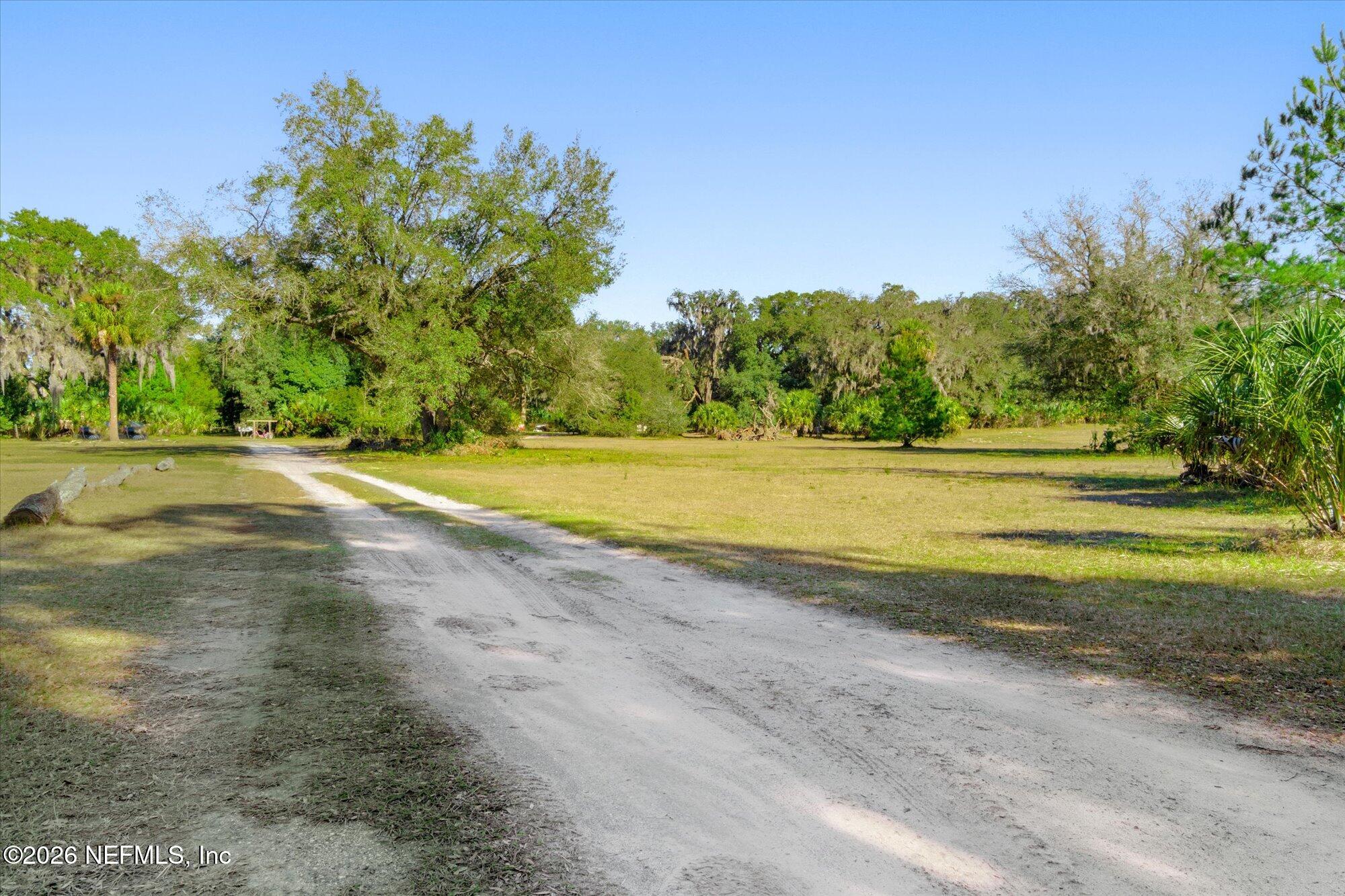 130 Sisco Road Pomona Park, FL 32181 - Photo 39 of 43 a view of a yard with an outdoor space
