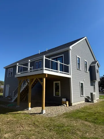 a front view of a house with garage
