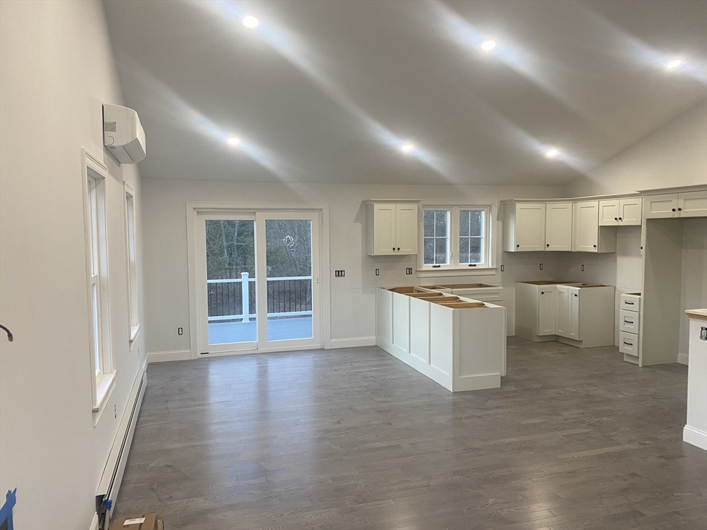 572 Wheelwright Road Barre, MA 01005 - Photo 5 of 8 a large kitchen with a large counter top appliances and cabinets
