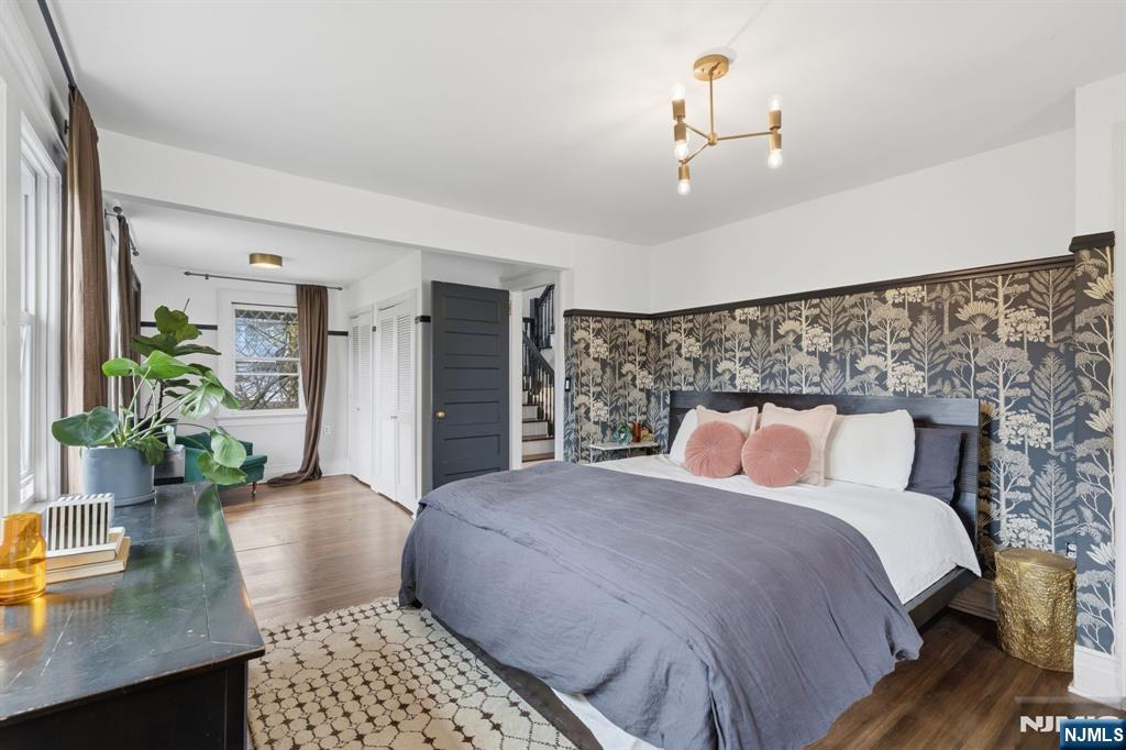 44 Norman Road Montclair, NJ 07043 - Photo 16 of 40 a bedroom with a large bed and a table