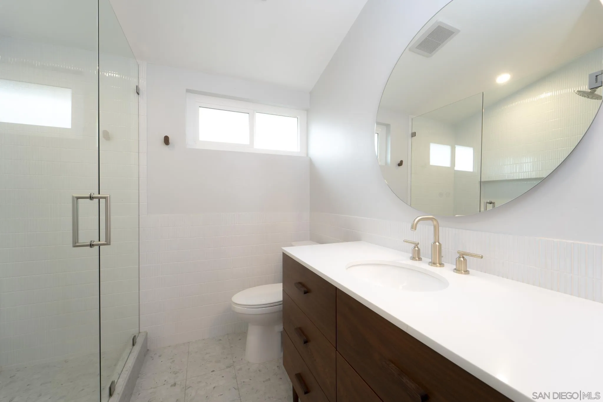 12938 Conley Street Poway, CA 92064 - Photo 14 of 30 a bathroom with a sink a toilet and shower