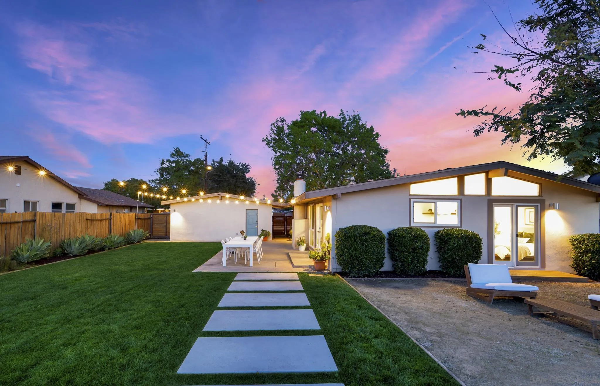 12938 Conley Street Poway, CA 92064 - Photo 21 of 30 a front view of a house with a yard and outdoor seating