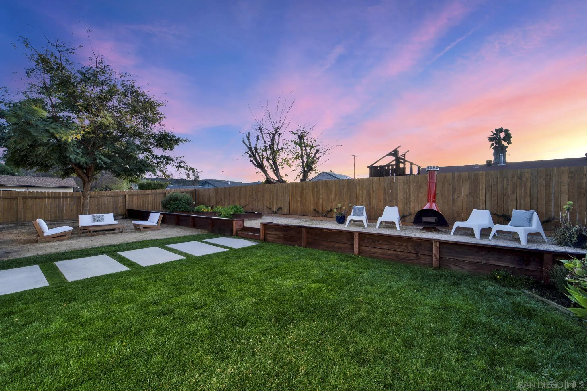 12938 Conley Street Poway, CA 92064 - Photo 22 of 30 a view of a house with a yard and sitting area