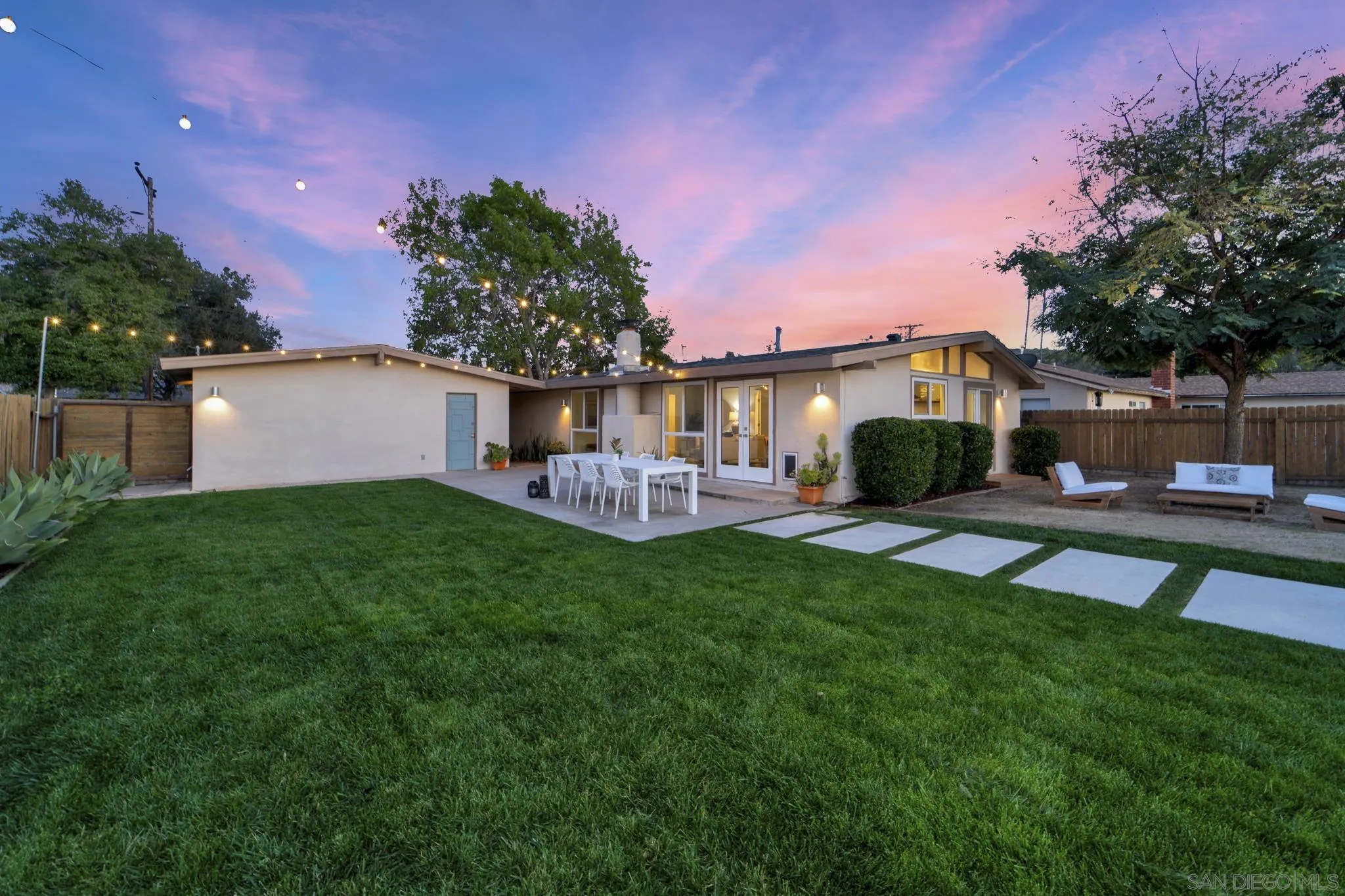 12938 Conley Street Poway, CA 92064 - Photo 23 of 30 a backyard of a house with table and chairs