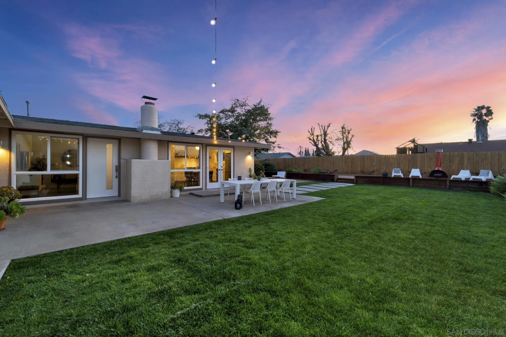 12938 Conley Street Poway, CA 92064 - Photo 24 of 30 a front view of a house with a garden and yard