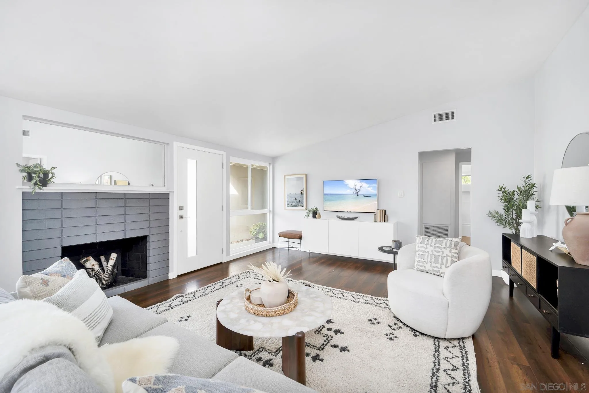 12938 Conley Street Poway, CA 92064 - Photo 5 of 30 a living room with furniture and a fireplace