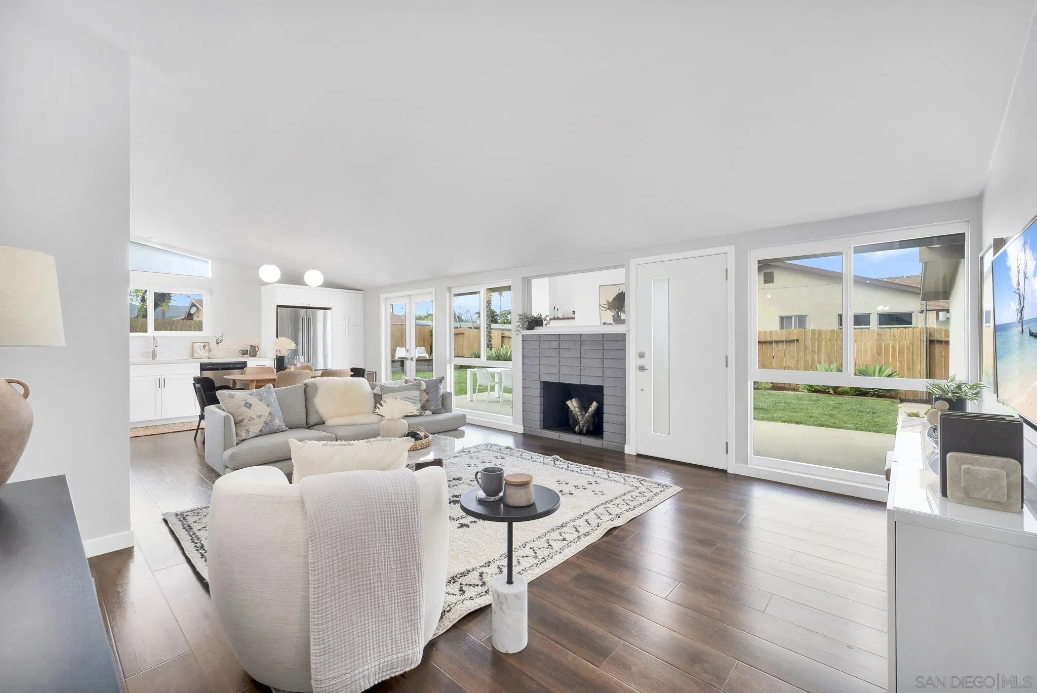 12938 Conley Street Poway, CA 92064 - Photo 6 of 30 a living room with furniture and a fireplace