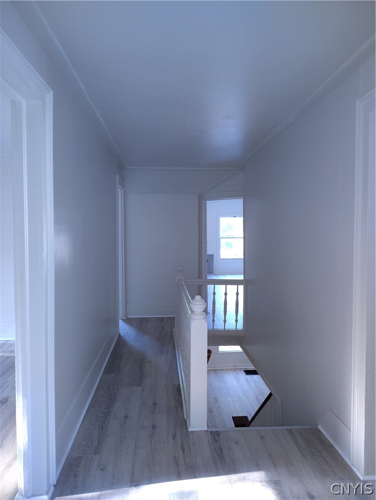 142 West Warrington Road Syracuse, NY 13205 - Photo 7 of 21 Upstairs hallway outside the bedrooms