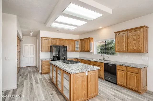 a kitchen with a stove and a sink
