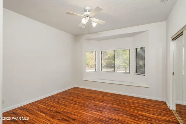 a view of a glass door with a balcony