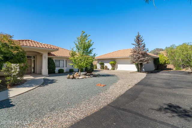 a view of a patio with mountains in the background