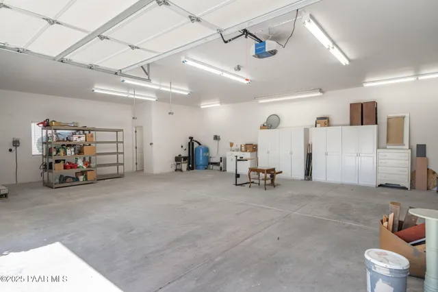 a view of a house with a mountain yard