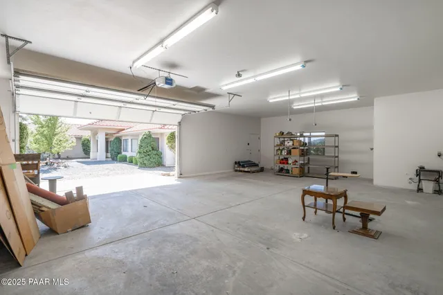 a view of a house with a yard and plant