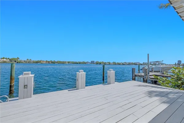 a deck view with a lake view