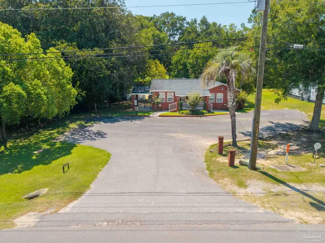 a view of swimming pool with a patio