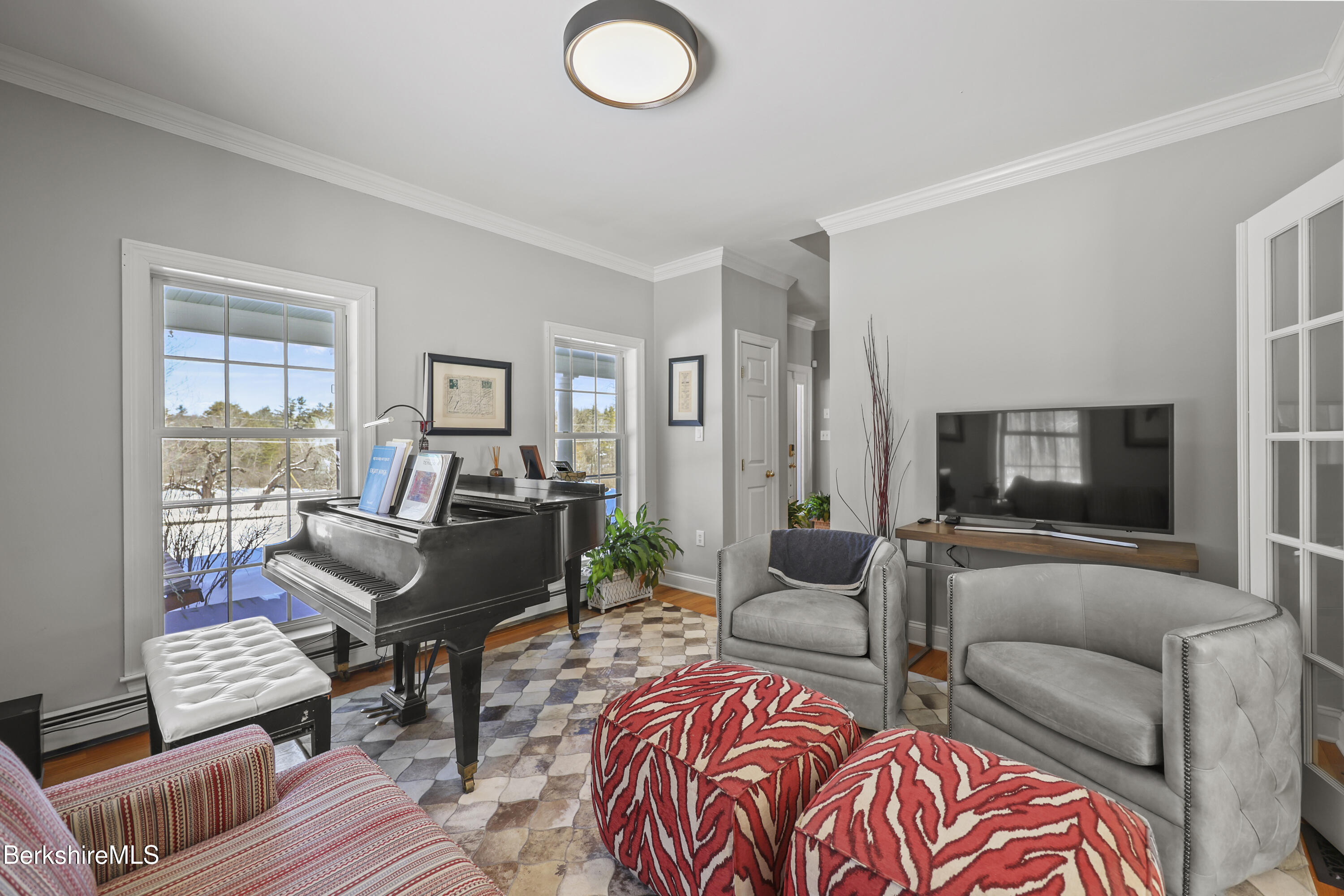 130 East Dugway Road Lenox, MA 01240 - Photo 23 of 89 a living room with furniture and a flat screen tv