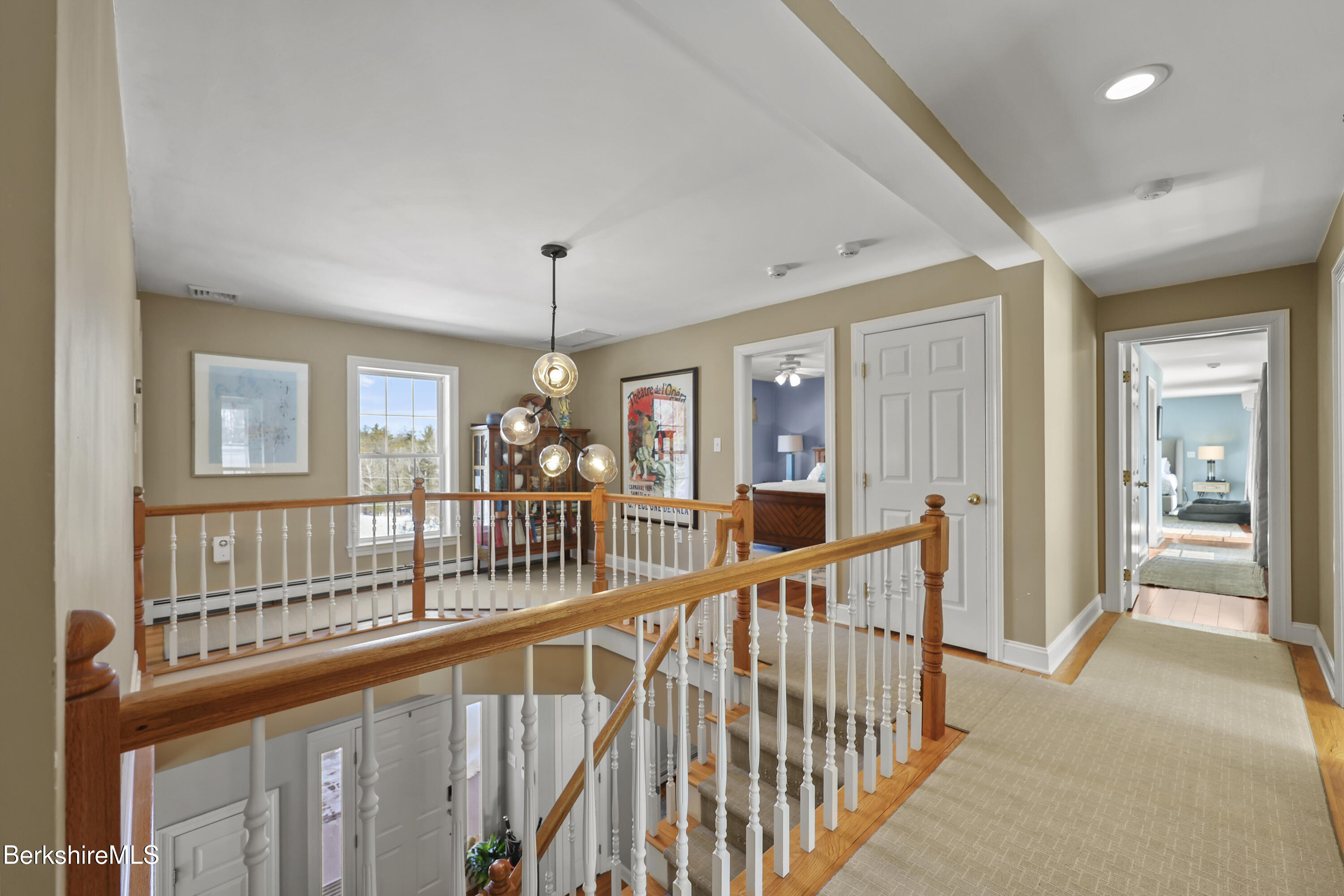 130 East Dugway Road Lenox, MA 01240 - Photo 32 of 89 a view of a hallway with wooden floor and windows