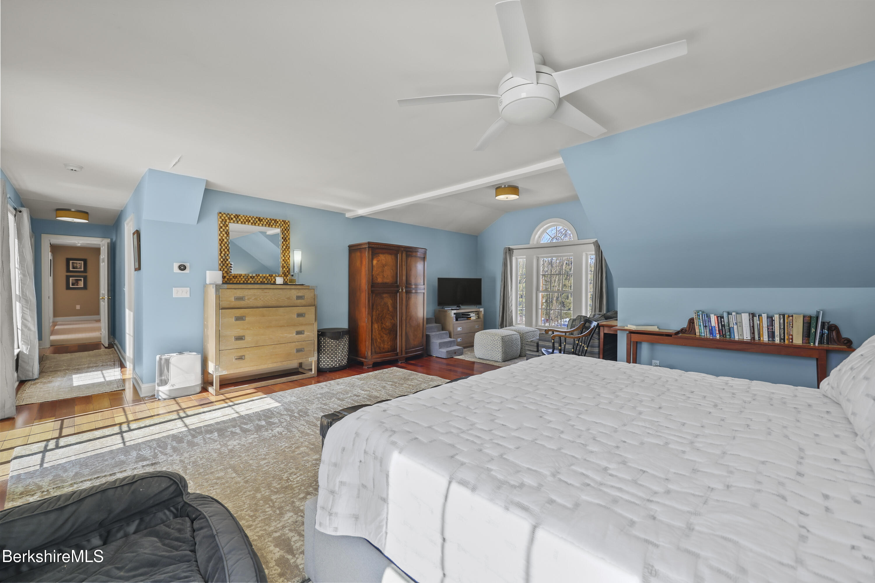 130 East Dugway Road Lenox, MA 01240 - Photo 35 of 89 a bedroom with a large bed and a chandelier
