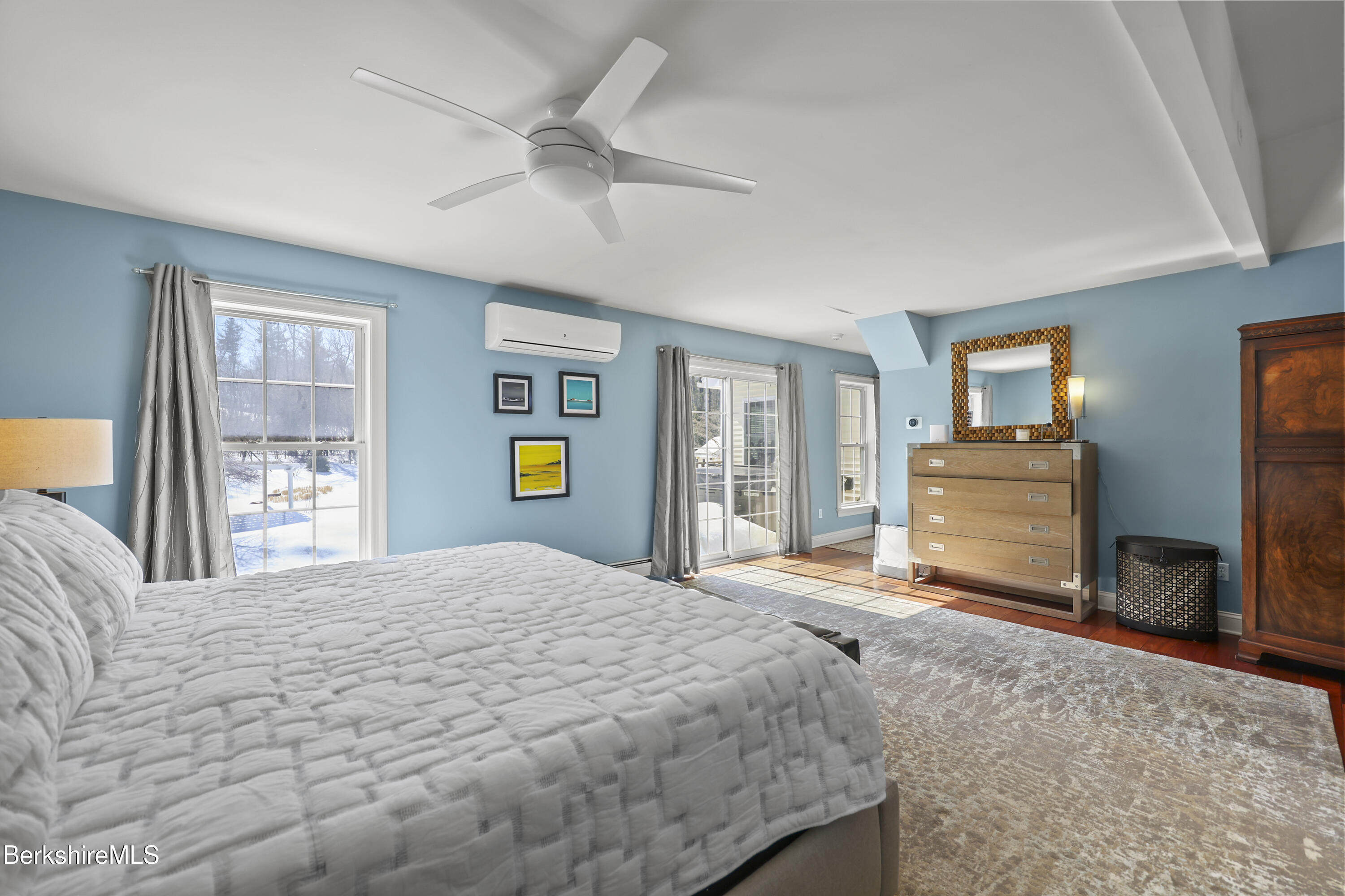 130 East Dugway Road Lenox, MA 01240 - Photo 37 of 89 a bedroom with a bed and dresser with mirror