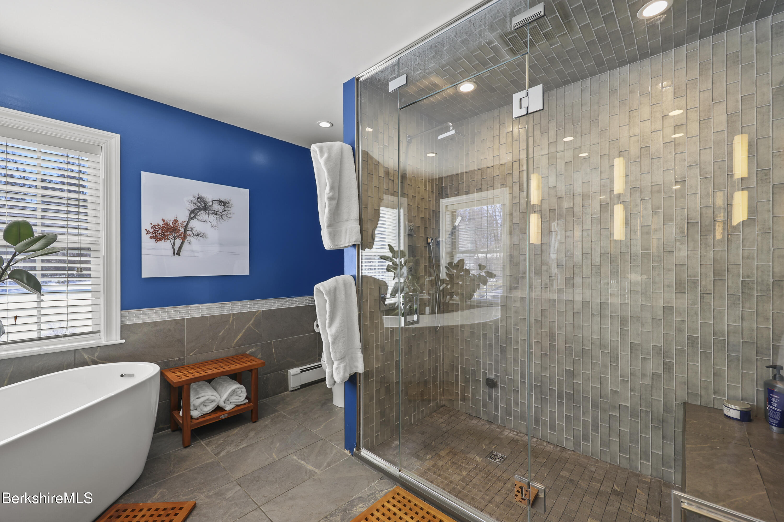 130 East Dugway Road Lenox, MA 01240 - Photo 41 of 89 a bathroom with a bathtub a shower a sink and mirror