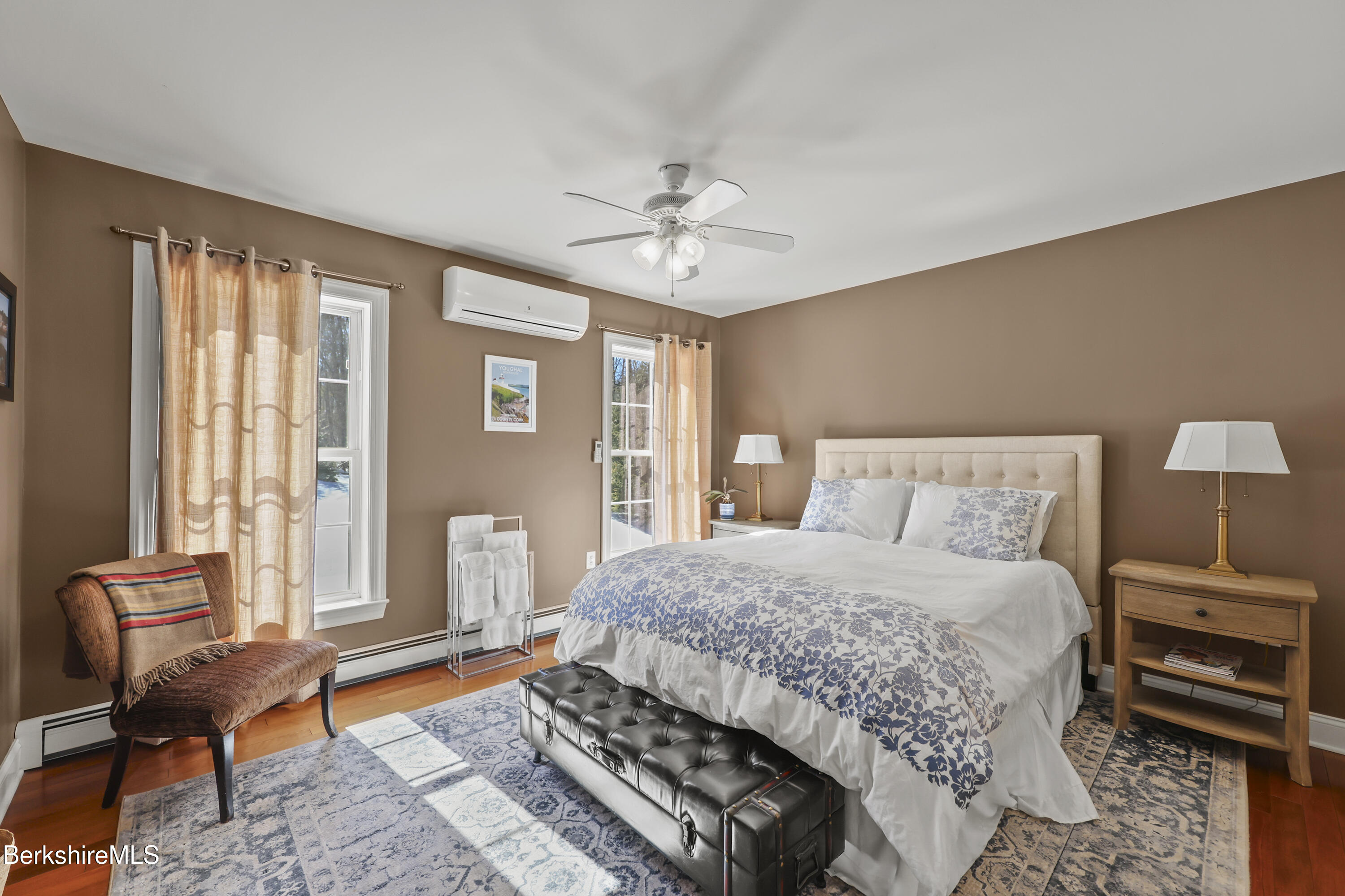 130 East Dugway Road Lenox, MA 01240 - Photo 44 of 89 a bedroom with a bed and a chandelier