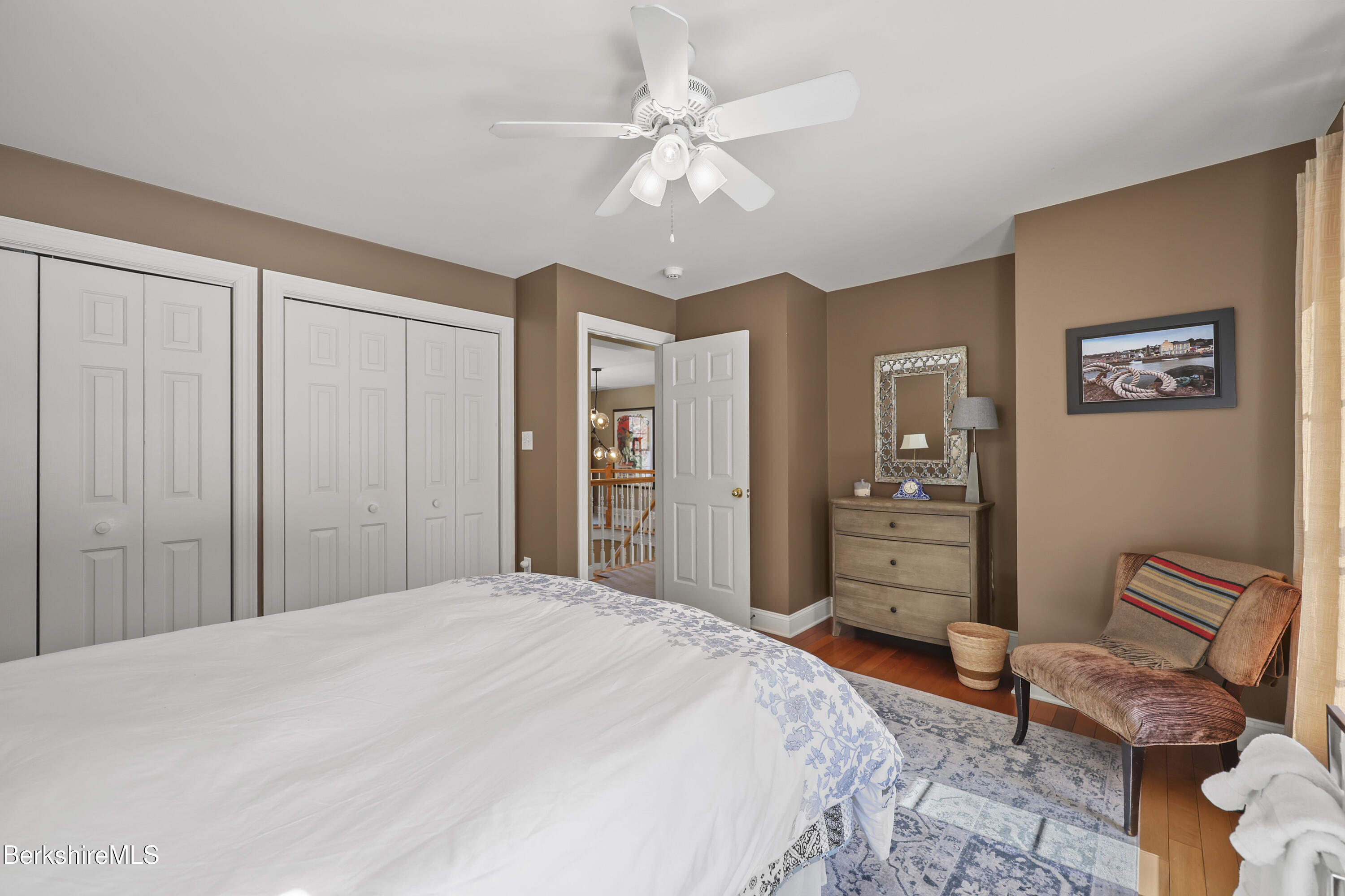 130 East Dugway Road Lenox, MA 01240 - Photo 45 of 89 a bedroom with a bed and dresser with mirror