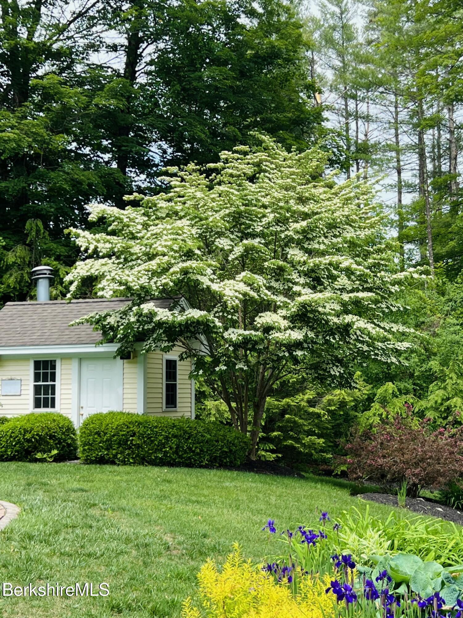 130 East Dugway Road Lenox, MA 01240 - Photo 73 of 89 a front view of a house with a yard