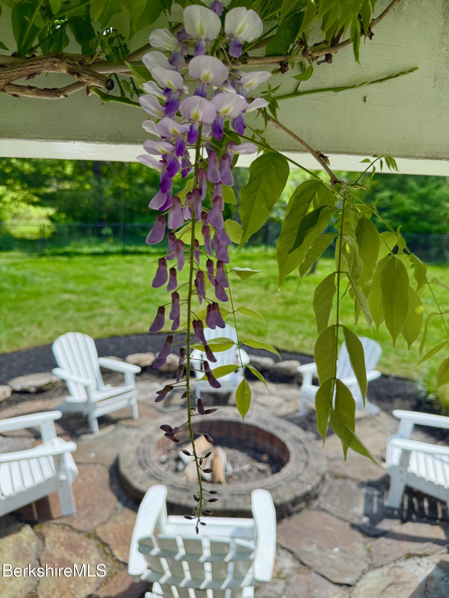130 East Dugway Road Lenox, MA 01240 - Photo 82 of 89 a view of backyard with plants and outdoor seating