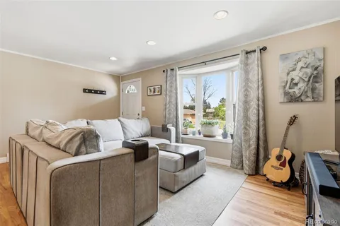 a bed room with furniture and a window