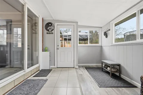a view of livingroom with furniture and windows