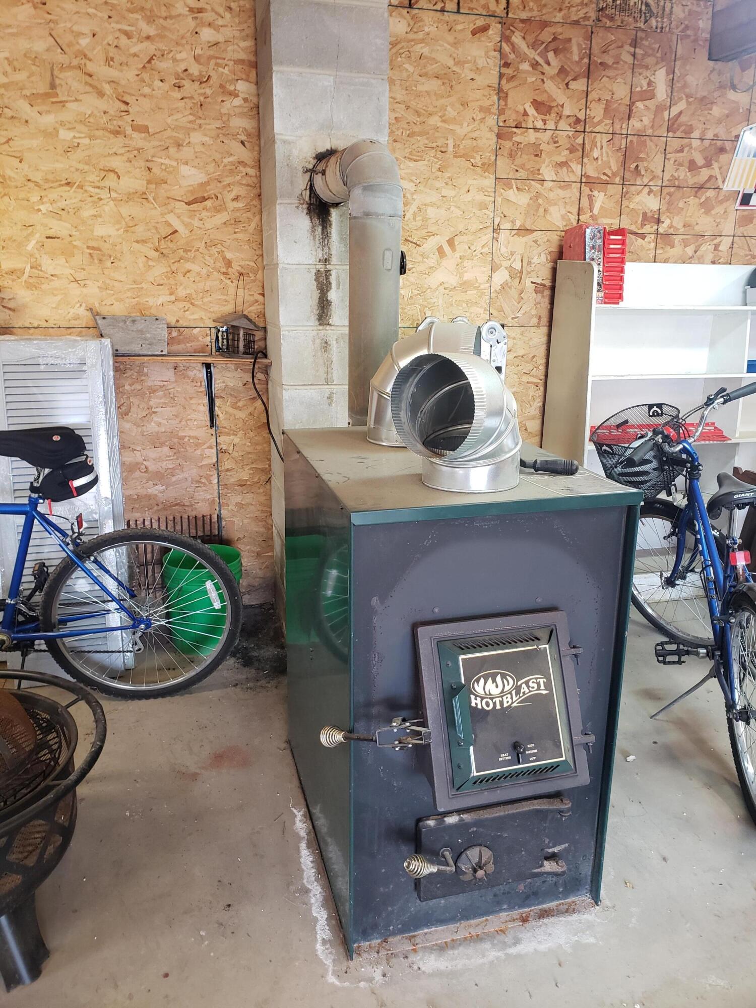 39 Winkumpaugh Road Orland, ME 04472 - Photo 57 of 57 Commercial woodstove i garage