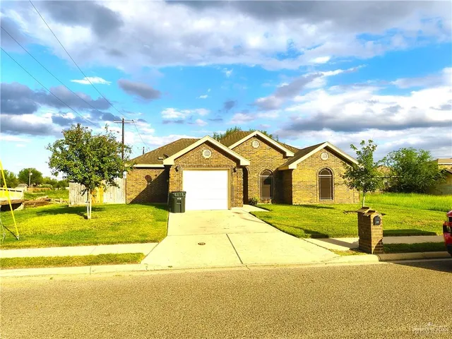 a bathroom with a sink and a yard