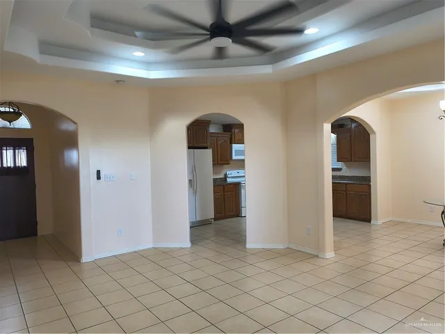 a view of a hallway with a bathroom