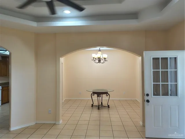 a view of a hallway with chairs