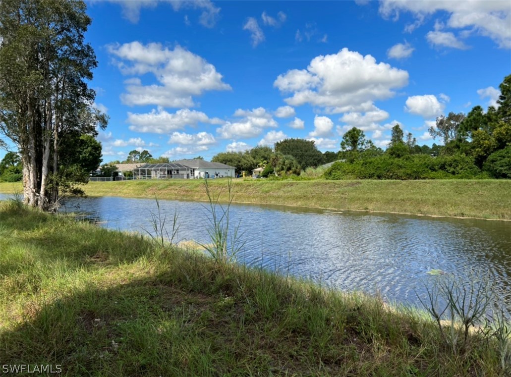 427 Jourferie Road Lehigh Acres, FL 33974 - Photo 5 of 10 a view of an ocean and beach