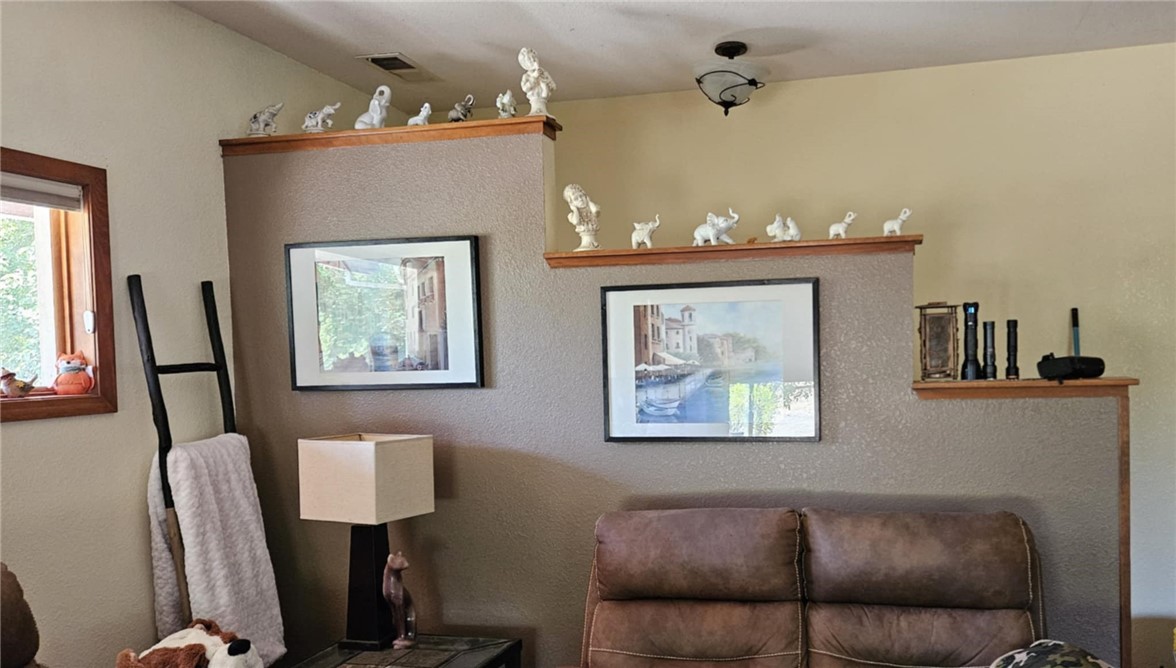 25205 5th Avenue Los Molinos, CA 96055 - Photo 11 of 37 a view of a livingroom with furniture and a window