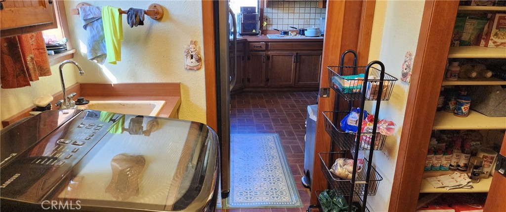 25205 5th Avenue Los Molinos, CA 96055 - Photo 17 of 37 a view of walk in closet with clothes and shoes