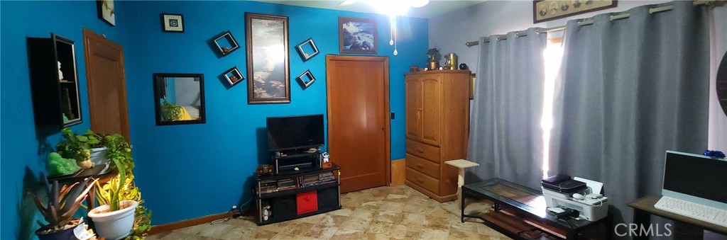 25205 5th Avenue Los Molinos, CA 96055 - Photo 19 of 37 a view of a living room with furniture and a flat screen tv