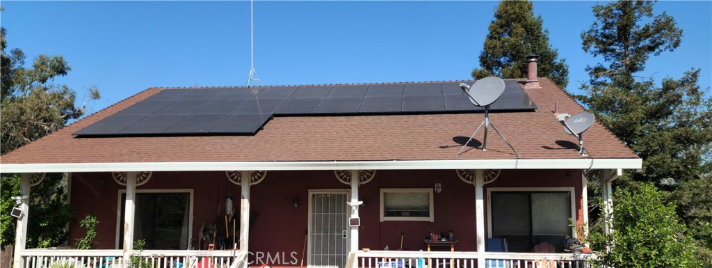 25205 5th Avenue Los Molinos, CA 96055 - Photo 2 of 37 a view of a house with a balcony