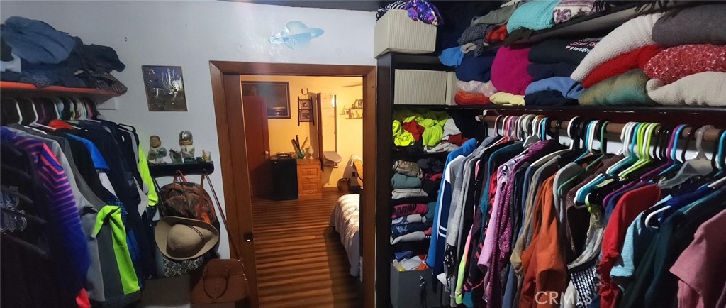 25205 5th Avenue Los Molinos, CA 96055 - Photo 29 of 37 a view of walk in closet with clothes and shoes