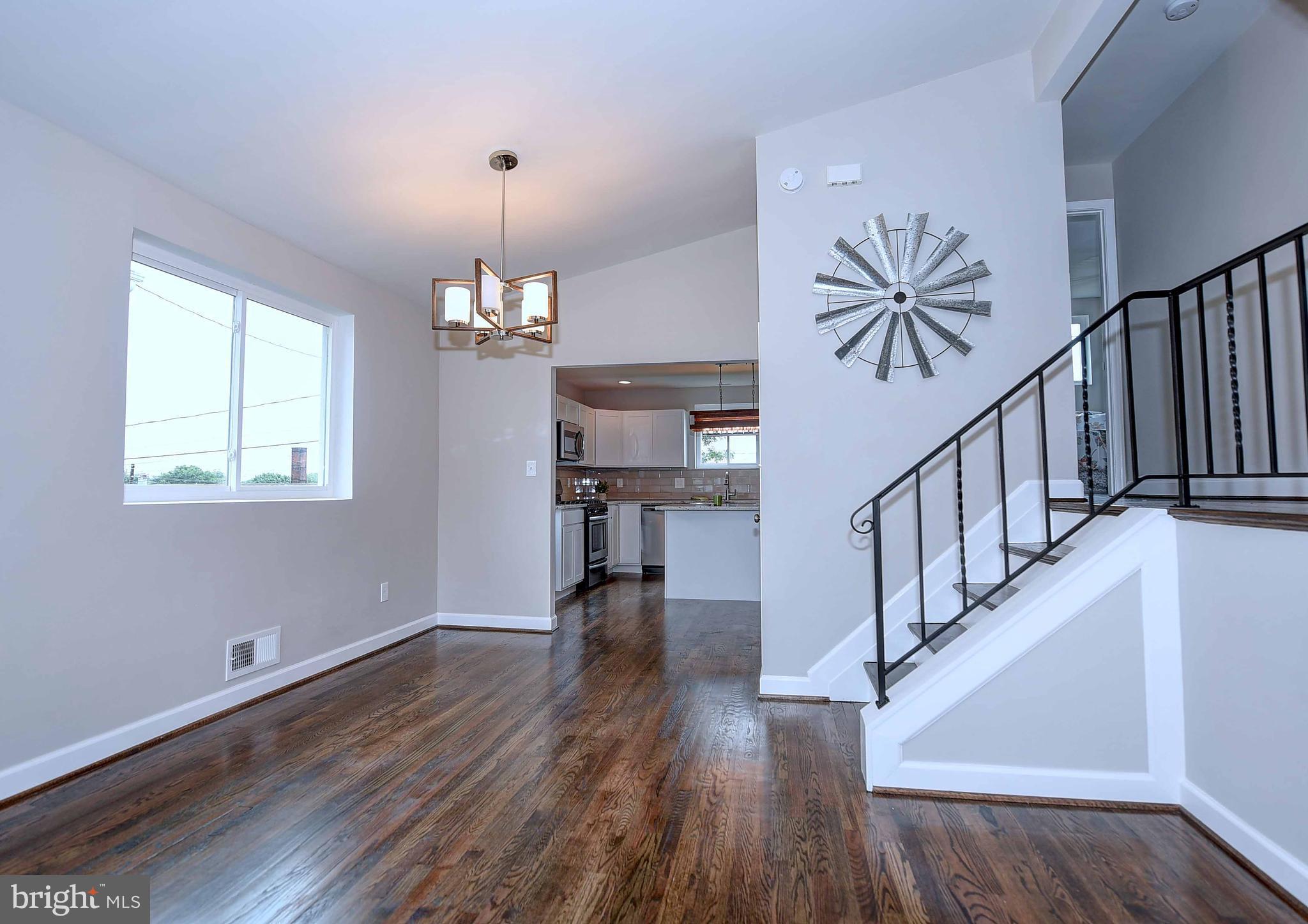1213 Ridgeshire Road Baltimore, MD 21222 - Photo 4 of 30 a view of entryway and hall with wooden floor