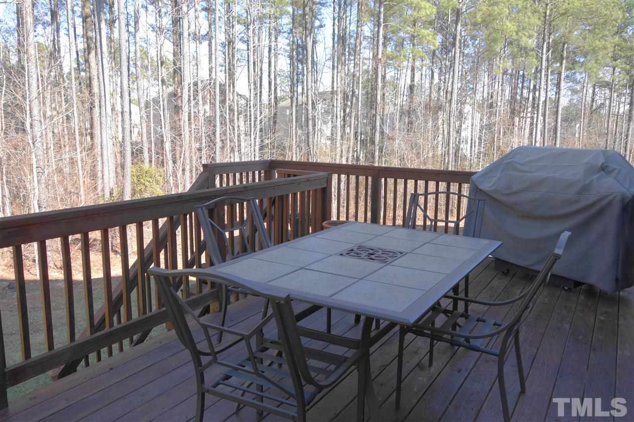 3121 Varcroft Road Knightdale, NC 27545 - Photo 22 of 25 a view of a dining room with furniture window and wooden floor